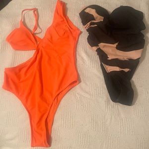Swim suits. Orange one pierce.Black and tan one piece.